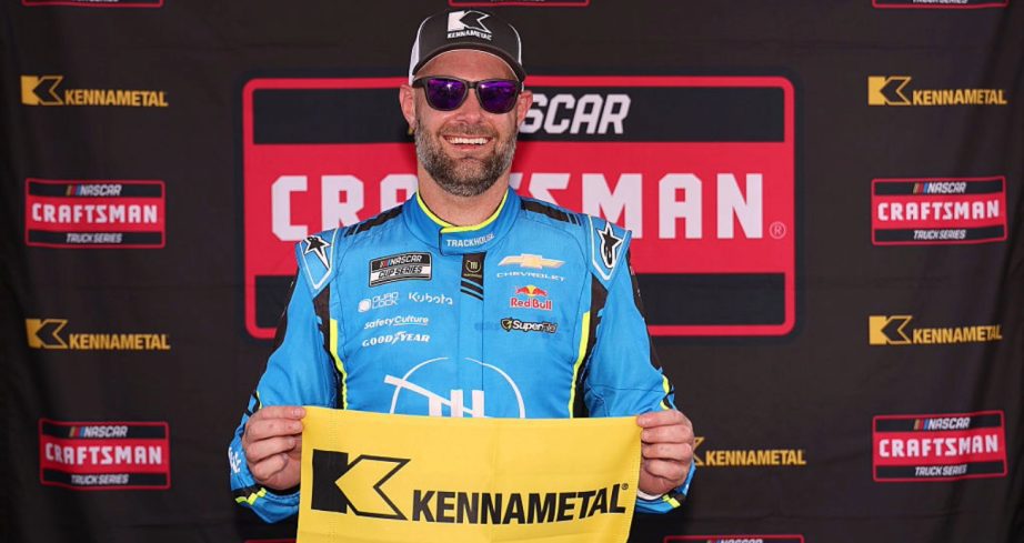 Shane van Gisbergen celebrates after winning the pole at Richmond.