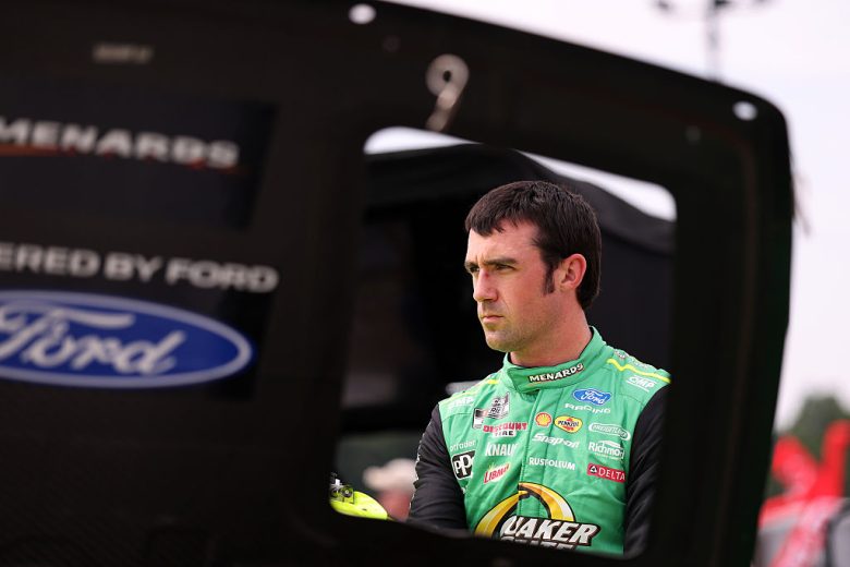 Austin Cindric looks on.