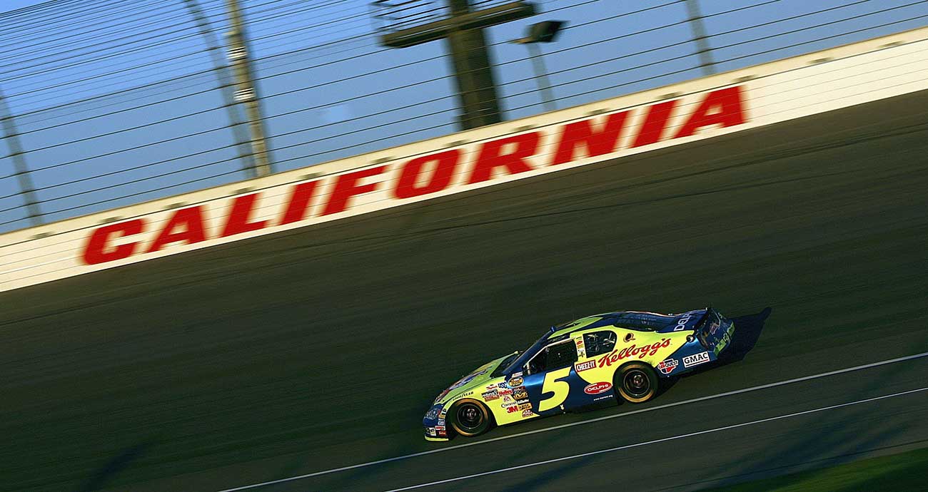 Kyle Busch's No. 5 Chevrolet roars through the turns at California Speedway in the 2005 Cup Series season.