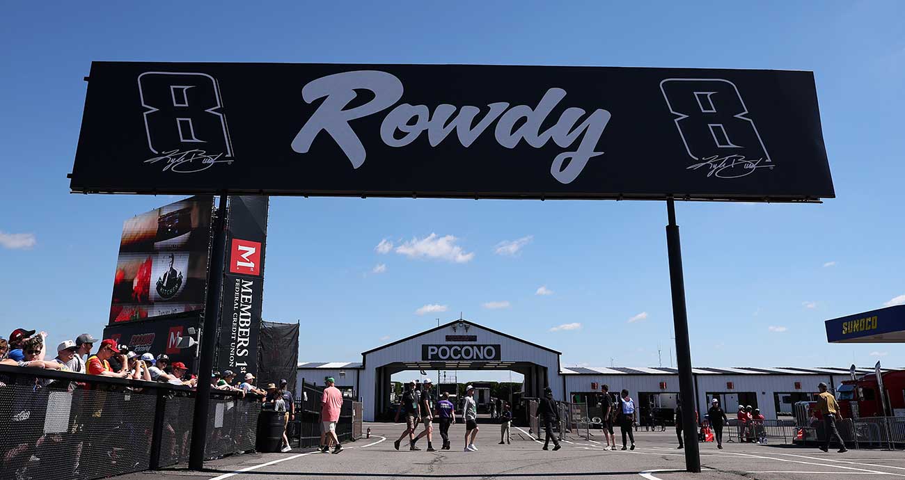 Kyle Busch's legacy is remembered on a billboard near the Cup Series garage at Pocono Raceway