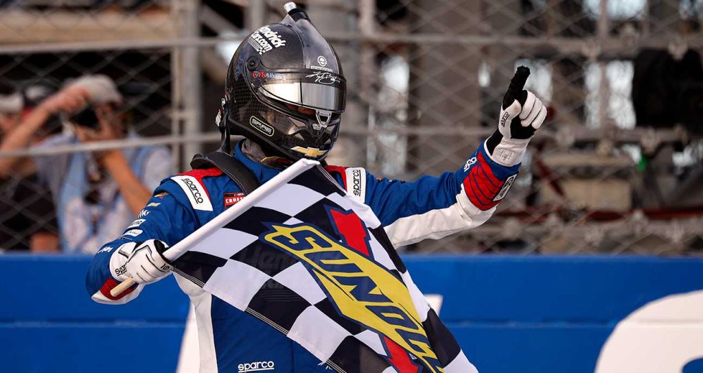 Kyle Busch celebrates his Truck Series win earlier this year at Dover Motor Speedway