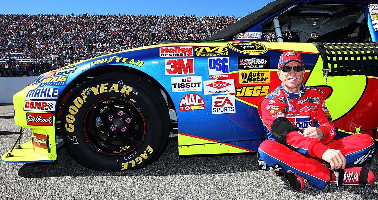 Mark Martin leans against his No. 5 Chevrolet on pit road at New Hampshire Motor Speedway in the 2009 Cup Series season