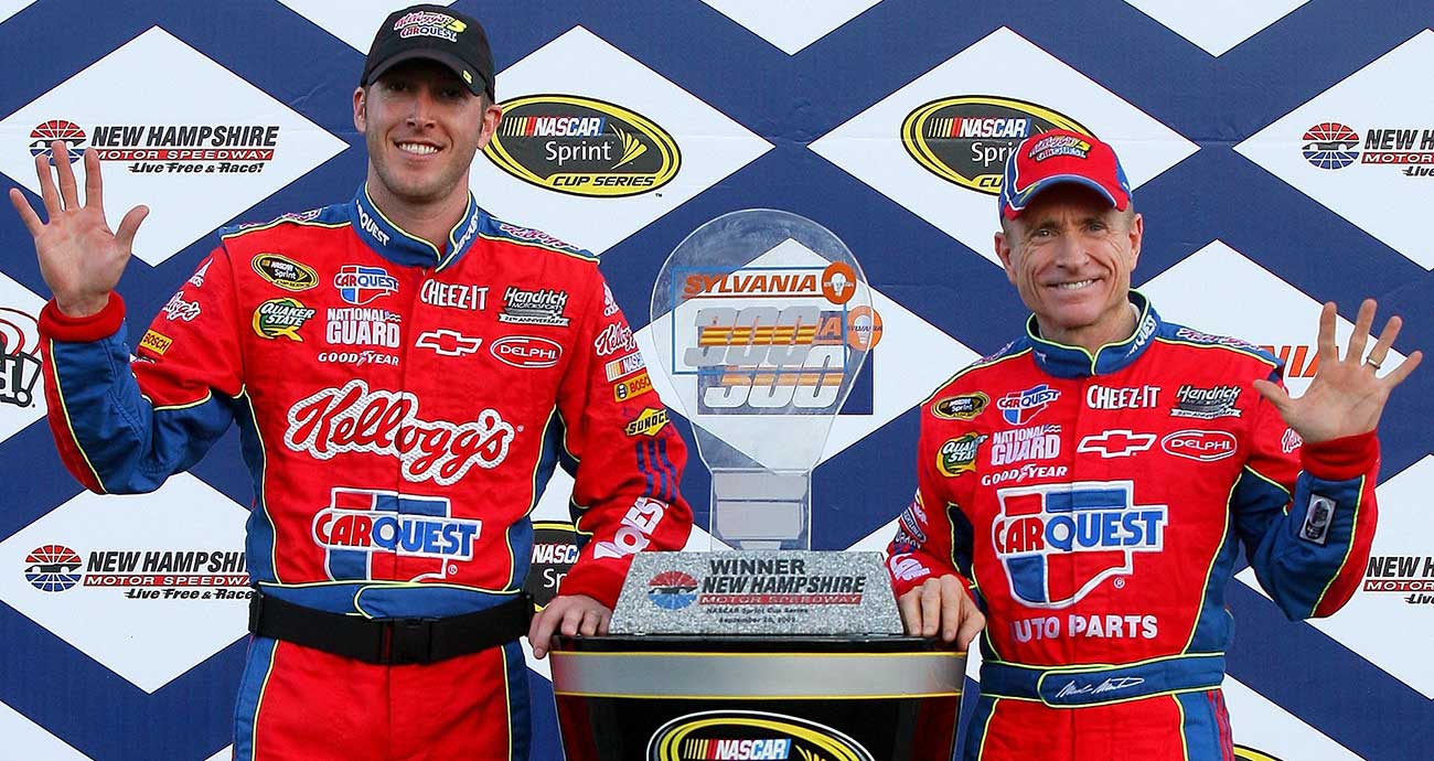 Mark Martin and crew chief Alan Gustafson celebrate at New Hampshire Motor Speedway in the 2009 Cup Series season