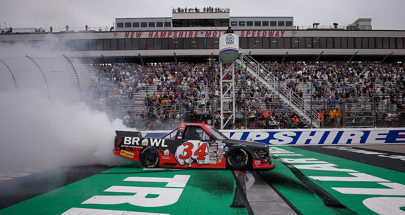 Layne Riggs lays down a smoky burnout with the No. 34 Ford at the start/finish line at New Hampshire Motor Speedway