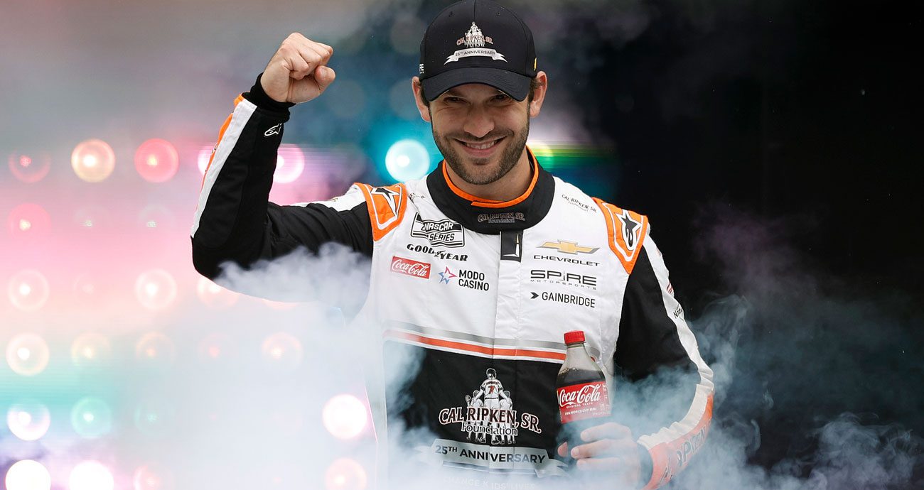 Spire Motorsports driver Daniel Suárez is introduced before a NASCAR Cup Series race.