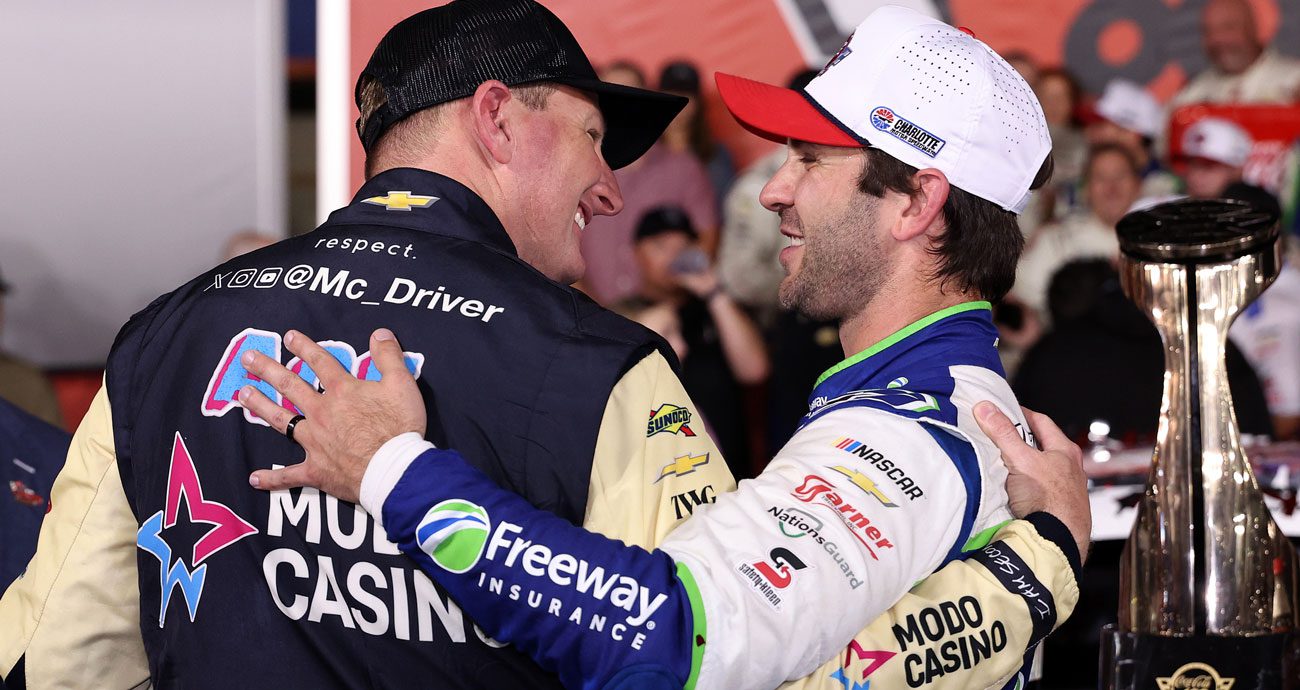 Spire teammates Michael McDowell and Daniel Suárez share an embrace after Suárez won the Coca-Cola 600.