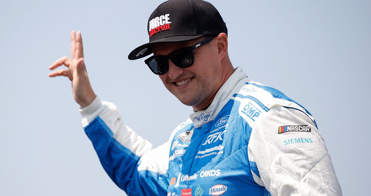 Ryan Preece waves before a NASCAR Cup Series race.