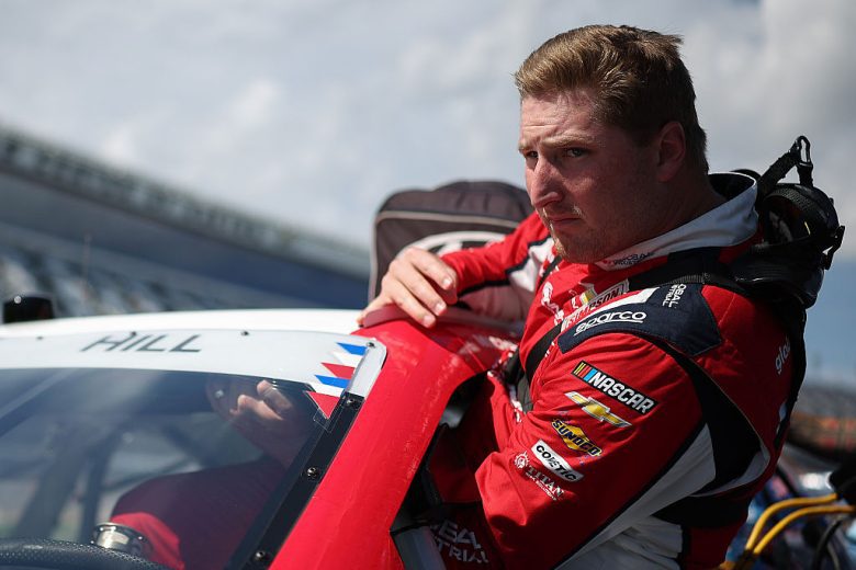 Austin Hill enters his car.
