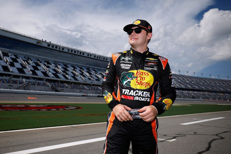 Carson Kvapil looks on.