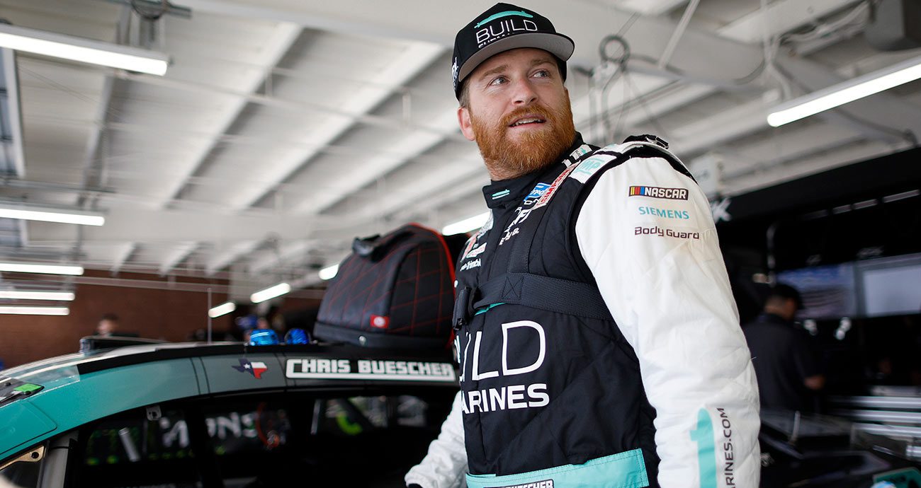 Chris Buescher looks on from the Cup Series garage at Dover Motor Speedway