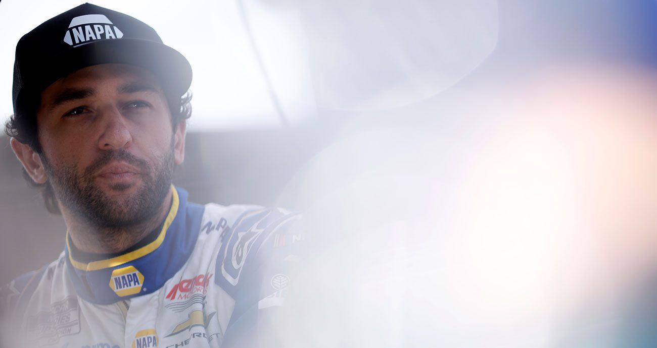 Chase Elliott looks on before a NASCAR Cup Series race.