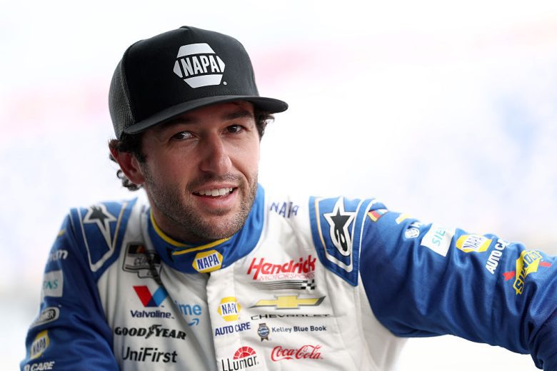 Chase Elliott looks on.
