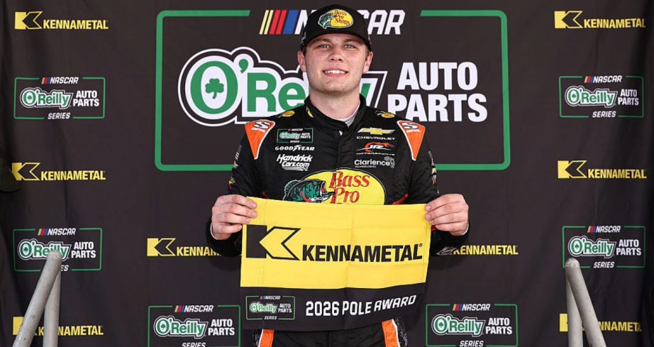 Carson Kvapil celebrates after winning the pole at Darlington.