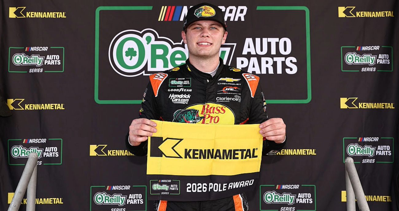 Carson Kvapil celebrates after winning the pole at Darlington.