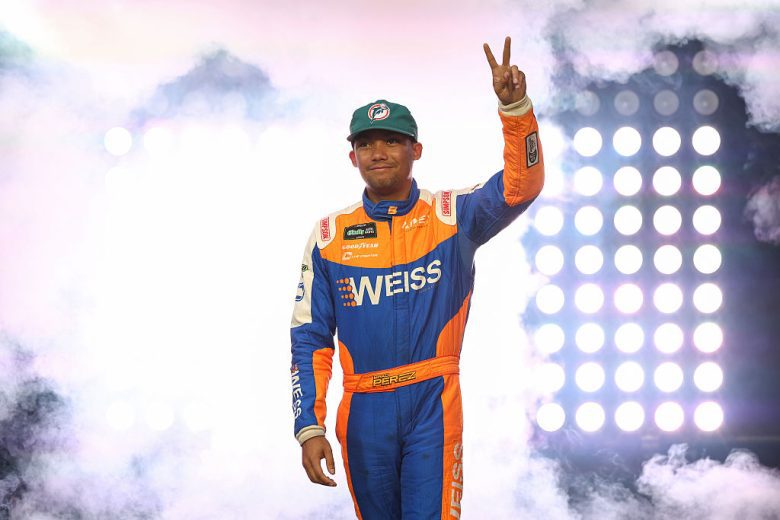 Brad Perez waves to fans.