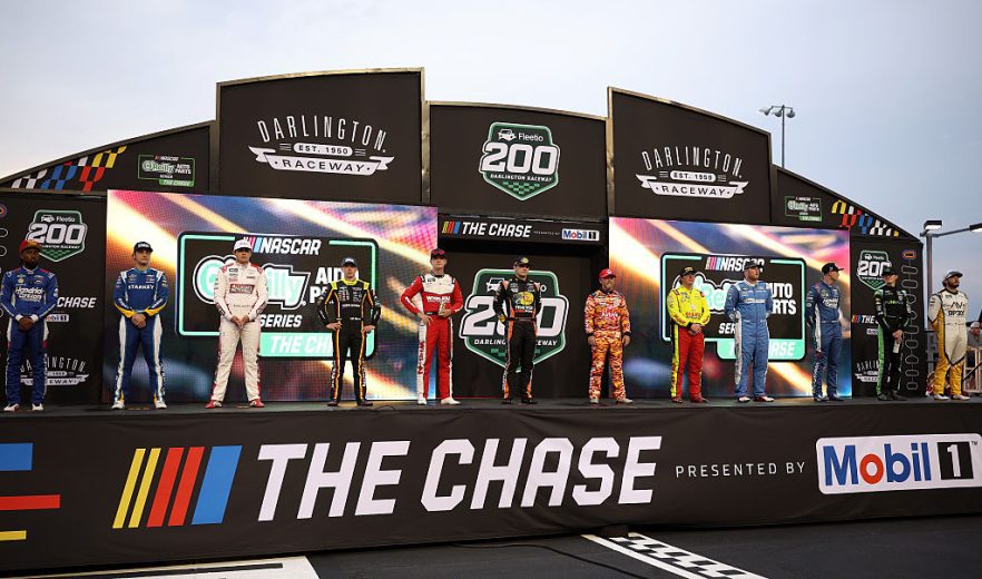 Chase drivers stand together.