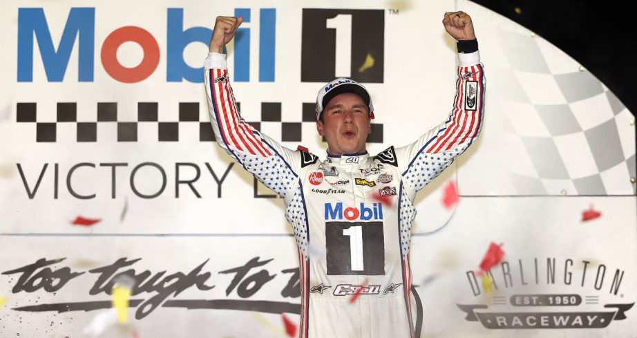 Christopher Bell celebrates in Victory Lane at Darlington Raceway.