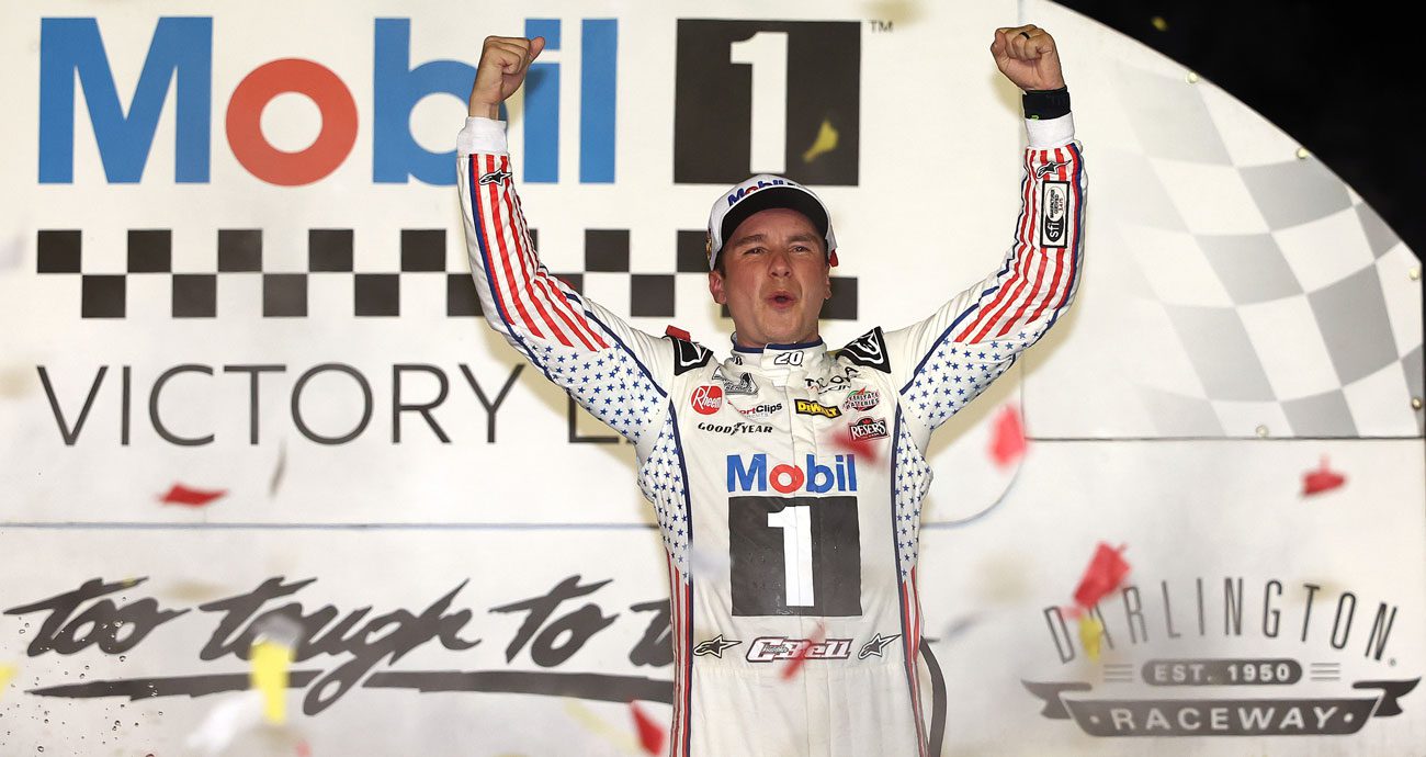 Christopher Bell celebrates in Victory Lane at Darlington Raceway.