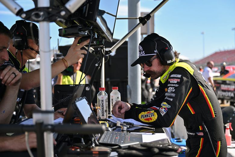 Ryan Blaney looks at data.