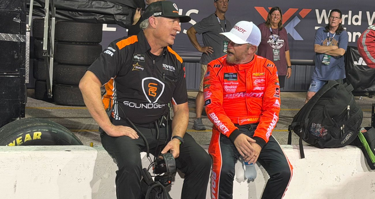 No. 18 crew chief Jeff Meendering and Justin Allgaier speak after a NASCAR O'Reilly Auto Parts Series race at Gateway.