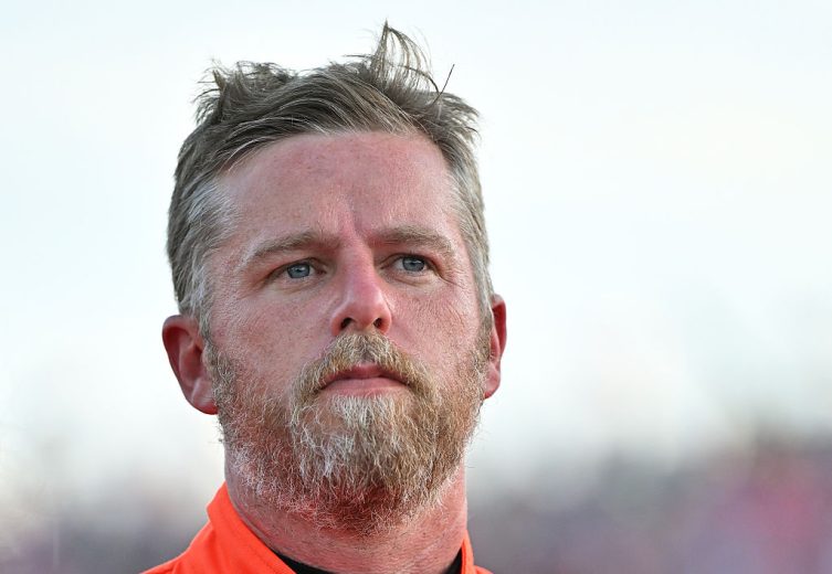 Justin Allgaier looks on.