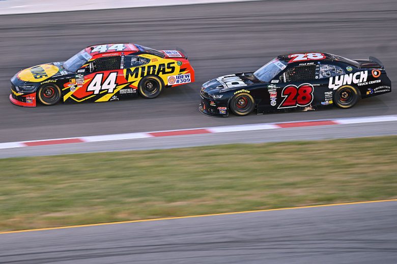 Brennan Poole and Kyle Sieg drive at Gateway.