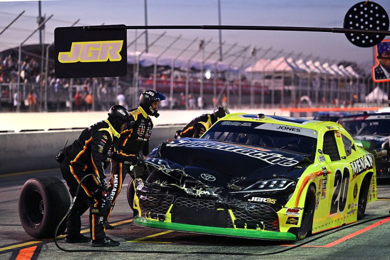 Brandon Jones' damaged car pits at Gateway.