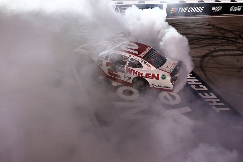 Jesse Love celebrates with a burnout after winning at Gateway.