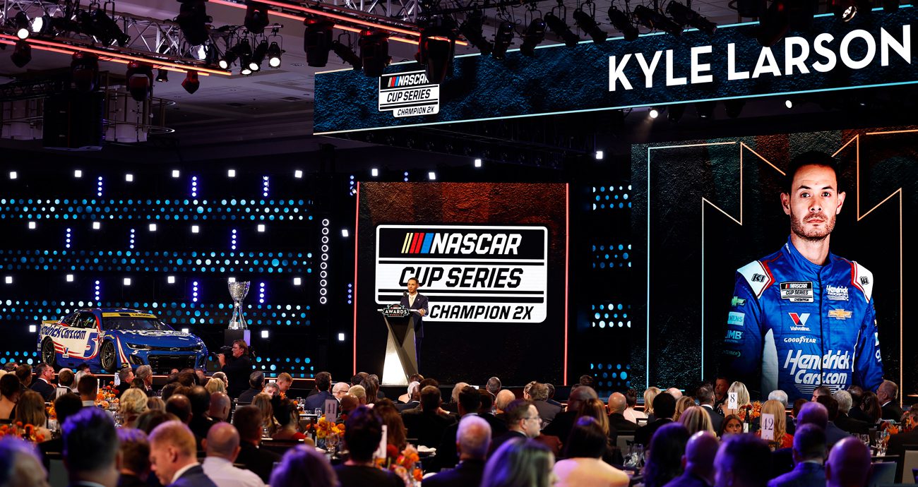 2025 NASCAR Cup Series champion Kyle Larson speaks on stage during the NASCAR Awards in Scottsdale, Arizona.