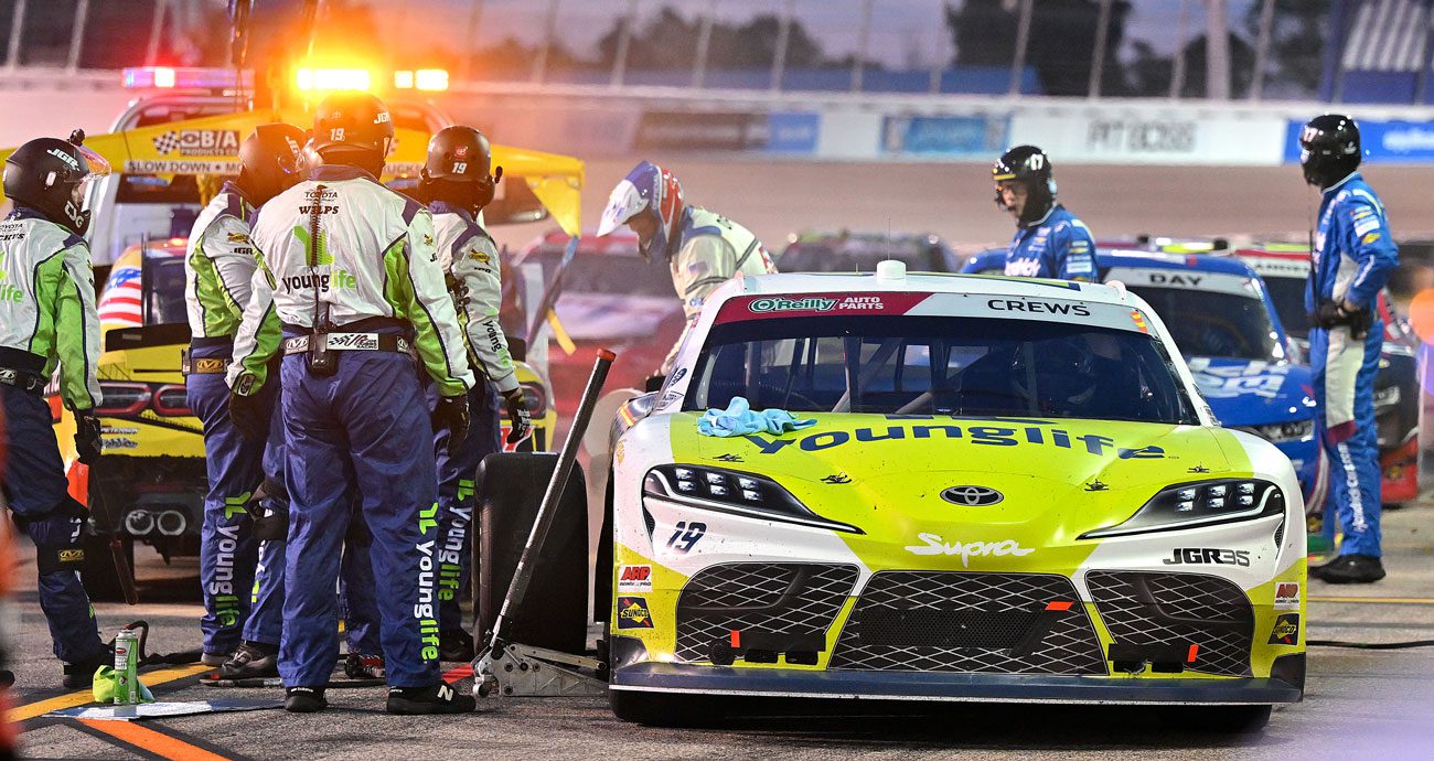 The No. 19 pit crew for Brent Crews looks on after a pit-road crash at Gateway.