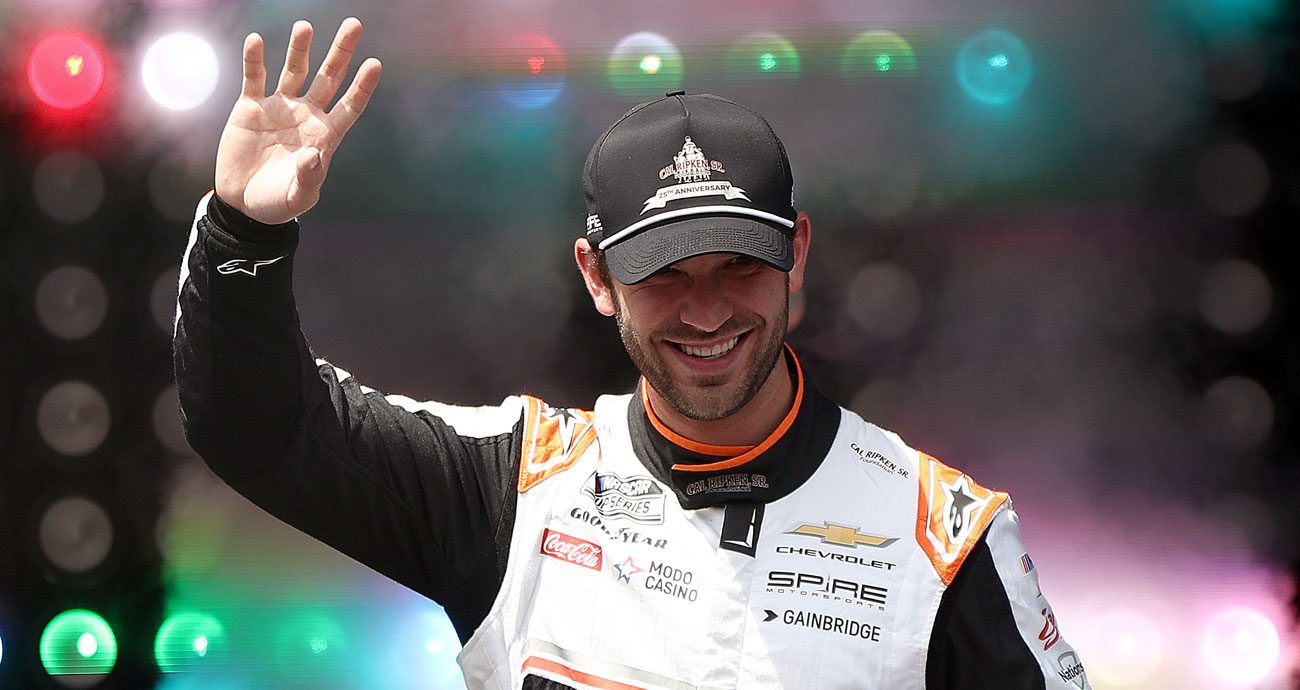 Daniel Suárez waves before a NASCAR Cup Series race.