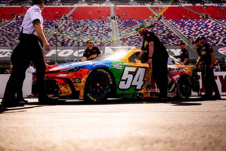 Ty Gibbs's crew pushes his car to the grid.