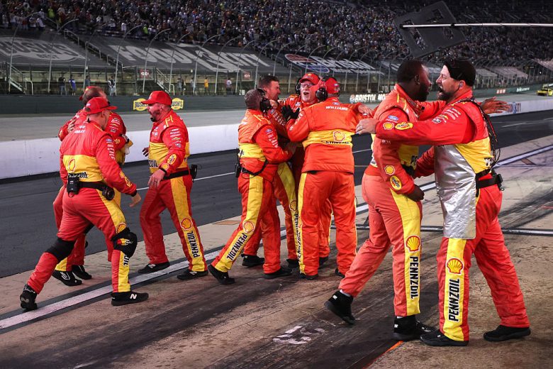 The No. 22 team celebrate Joey Logano's win at Bristol.