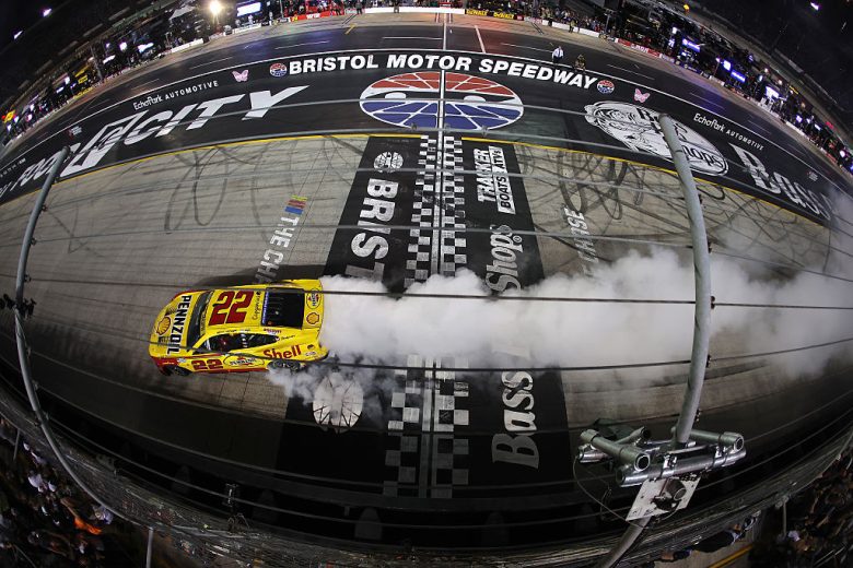 Joey Logano celebrates with a burnout at Bristol.