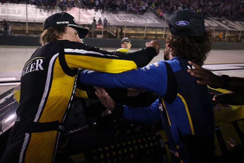 Carson Hocevar and Ryan Blaney fight.