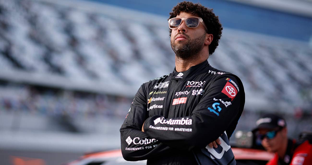 Bubba Wallace looks on from the qualifying grid at Daytona International Speedway