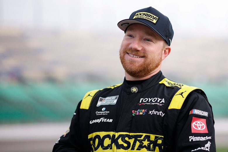 Tyler Reddick looks on.