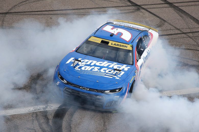 Kyle Larson does a celebratory burnout.