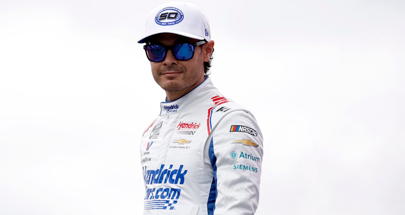 Kyle Larson, driver of the No. 5 HendrickCars.com Chevrolet, walks onstage during driver intros before the NASCAR Cup Series Hollywood Casino 400 at Kansas Speedway on Sept. 27, 2026 in Kansas City, Kansas.