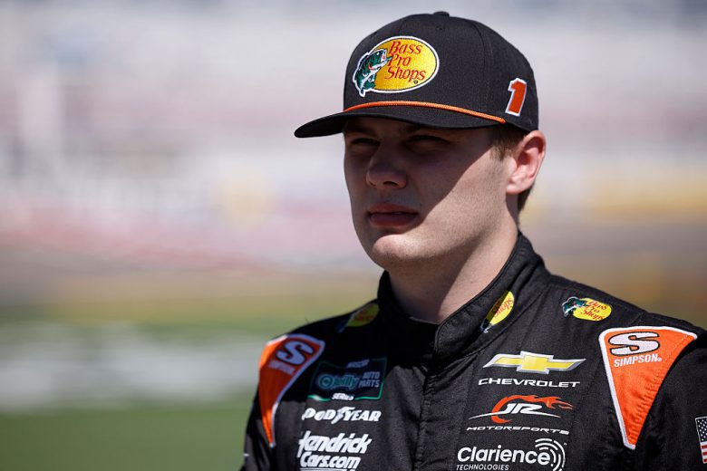 Carson Kvapil looks on.