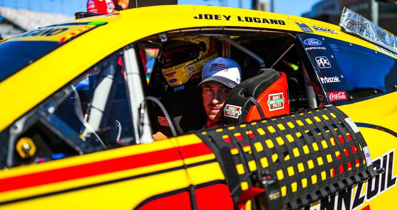 Joey Logano sits in his Team Penske Ford at Las Vegas.