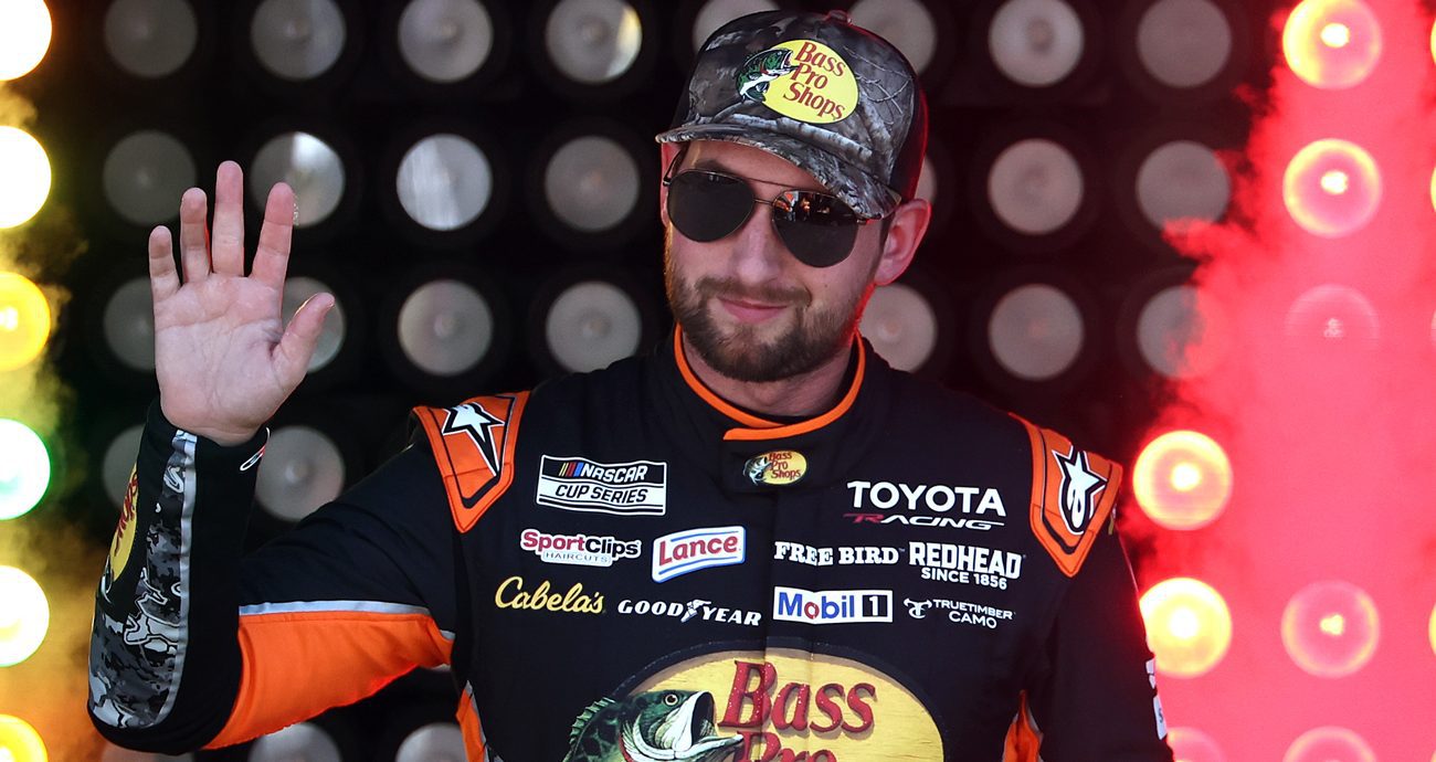 Chase Briscoe, driver of the No. 19 Bass Pro Shops Toyota, waves to fans as he walks onstage during driver intros befor the NASCAR Cup Series South Point 400 at Las Vegas Motor Speedway on Oct. 4, 2026 in Las Vegas, Nevada.