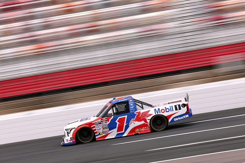 Brent Crews drives at Charlotte.