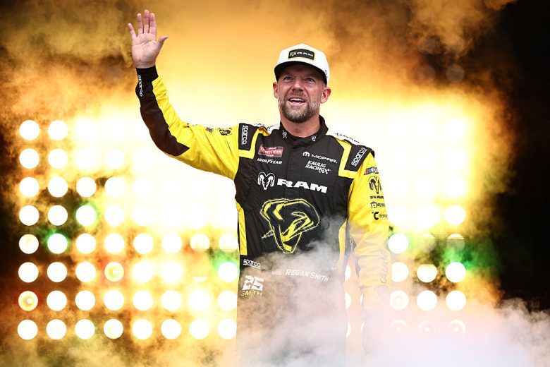 Regan Smith waves to fans.