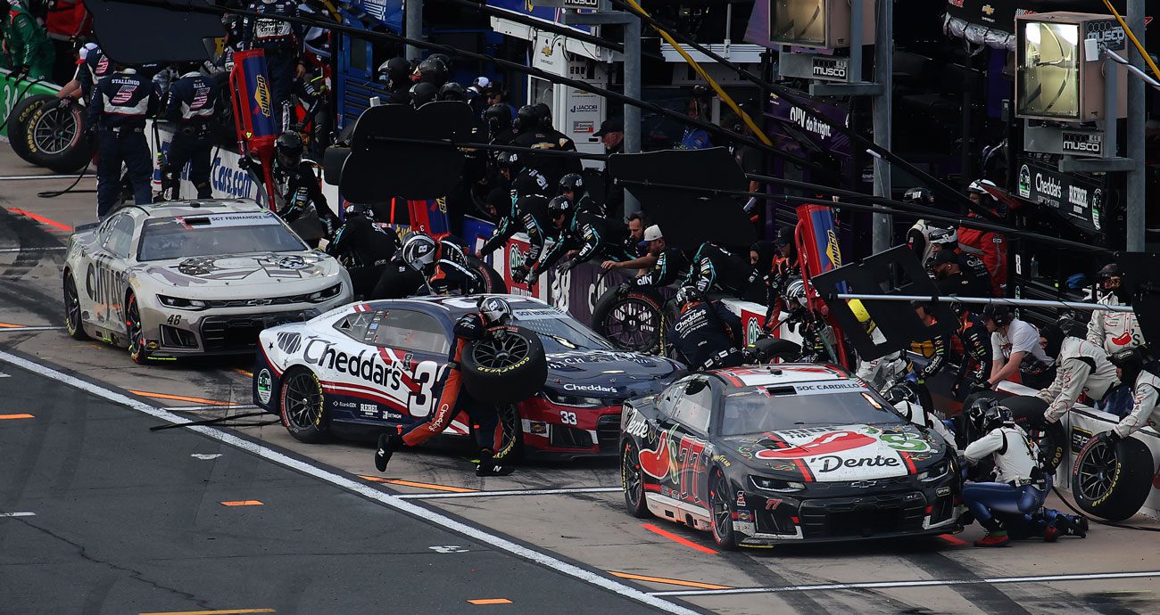 NASCAR Cup Series teams pit at Charlotte.