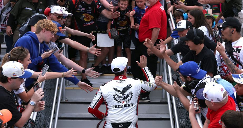 Chase Briscoe greets the crowd after a Charlotte Chase win.
