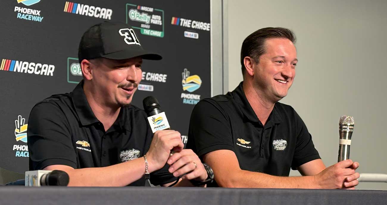 Brennan Poole and Jordan Anderson smile at a press conference at Phoenix Raceway