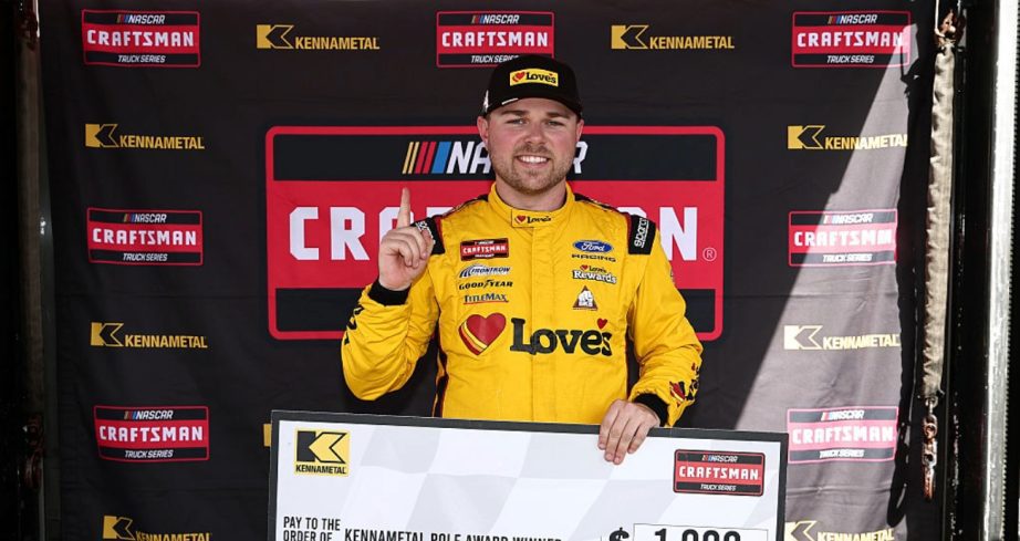 Layne Riggs celebrates after winning the pole at Phoenix.