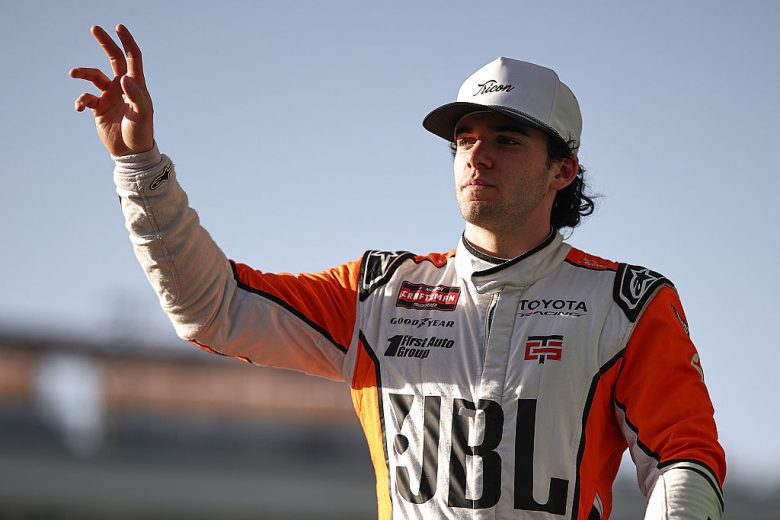 Gio Ruggiero waves to fans.