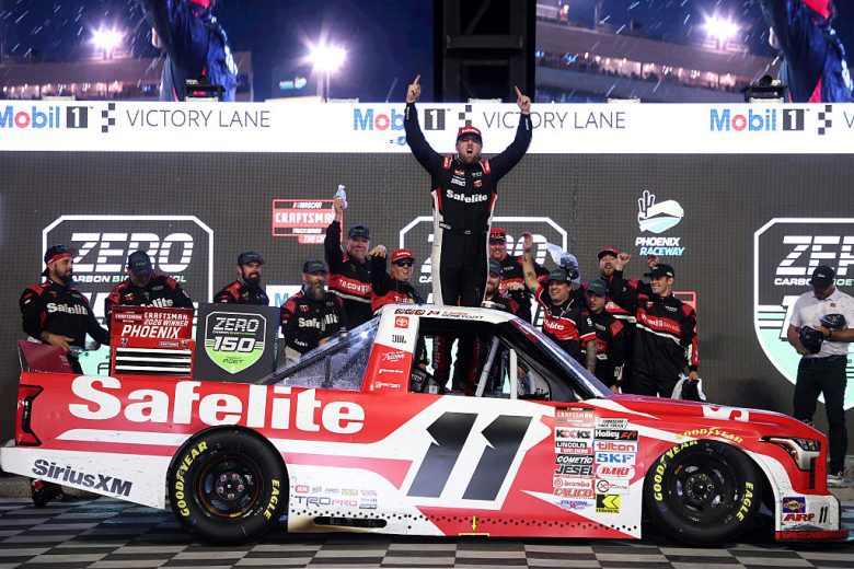 Kaden Honeycutt celebrates in Victory Lane after winning at Phoenix.